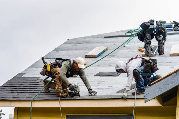 Professional Roofing technician working in Warwick, RI